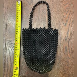 Vintage early 90’s Bottega Veneta mini beaded bucket bag.